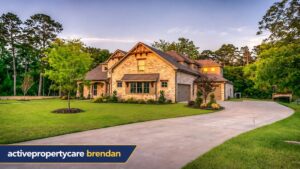 Modern brick home with landscaped lawn featured by activepropertycare brendan